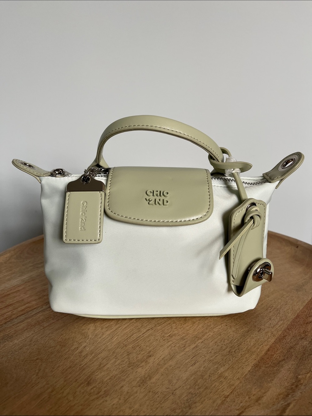 Mini Top-Handle Bag in Cream & Sage Green with Hang tag and Clochette